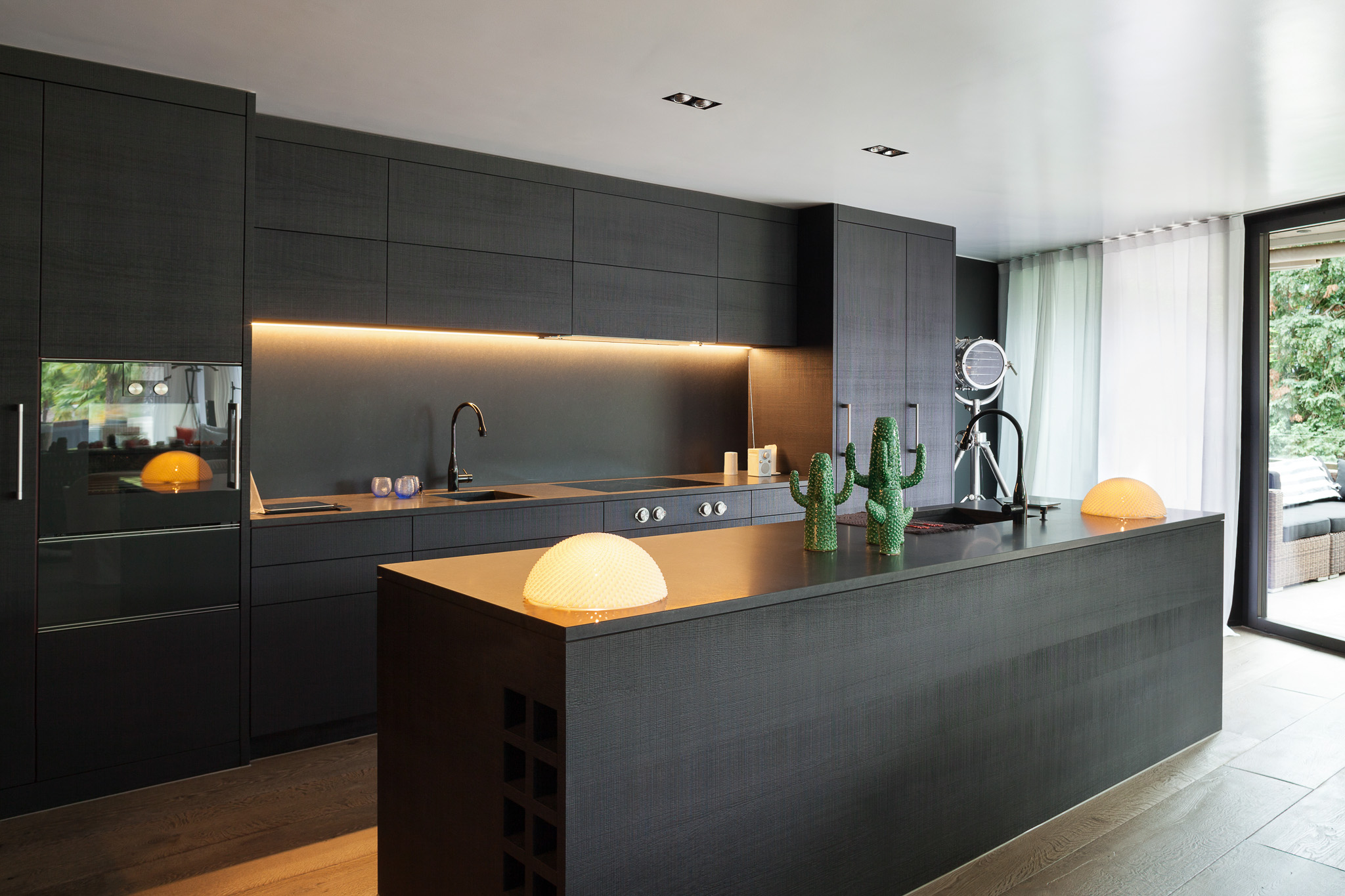 Modern kitchen with black furniture